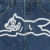 Jeanshose mit „Running Dog“-Motiv und doppeltem Bund