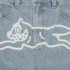 Jeanshose mit „Running Dog“-Motiv und doppeltem Bund